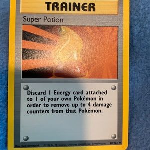 Pokémon dragonite fossil and Super potion trainer